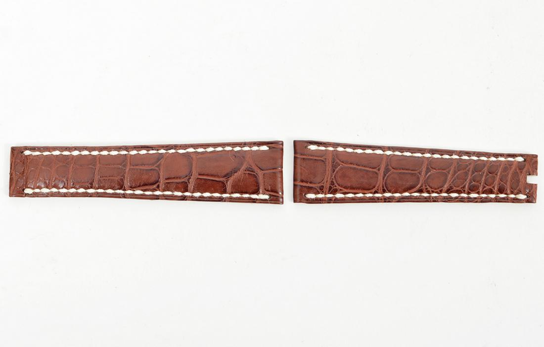 Rolex Brown Crocodile Watch Band NEW: Rolex brown genuine crocodile watch band. Part number: 214-561-L. Lug size: 20mm. Condition report: New. Please examine all photos closely. Contact C. Biddle Auction Gallery for more detailed informat