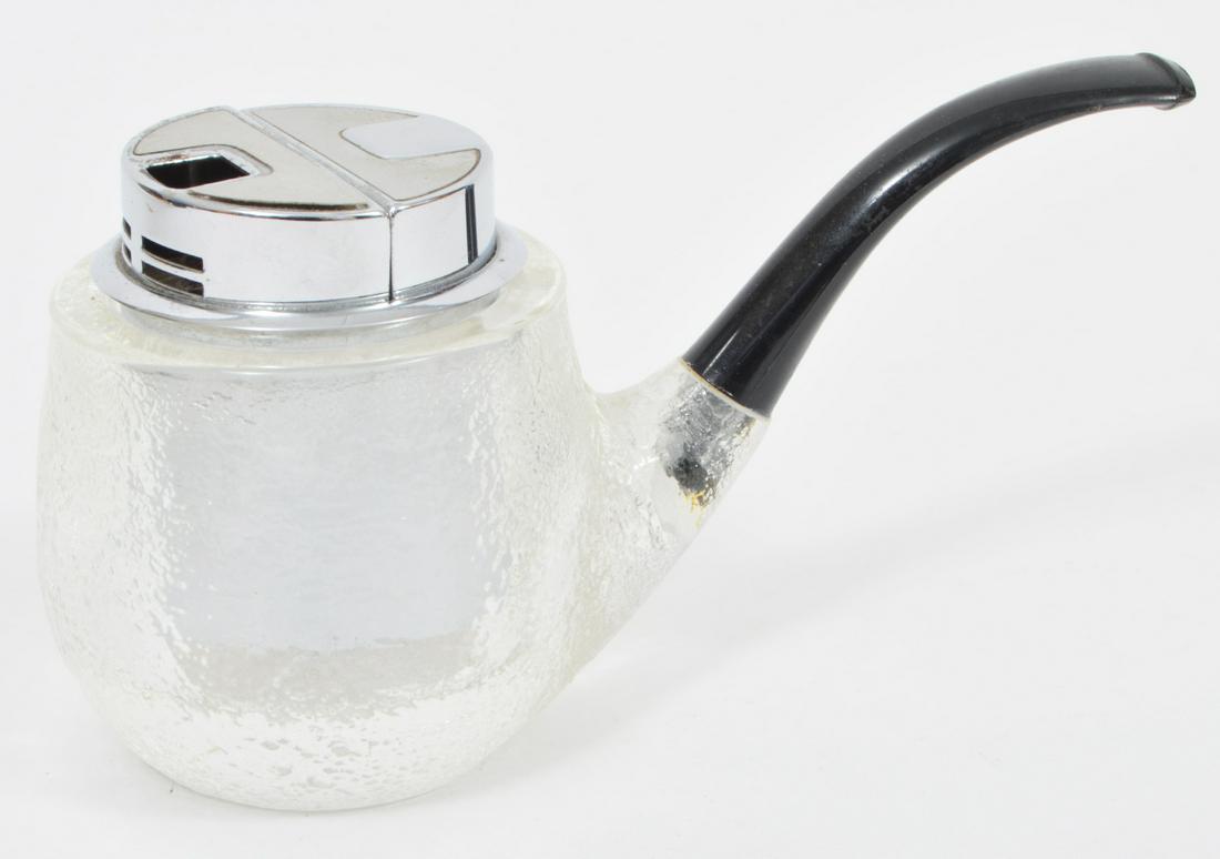 Vintage Calibri 'Pipe' Lighter: Vintage Calibri 'Pipe' table lighter in textured glass with silver tone lighter insert. Measures 3.25"H x 6"L. Condition report: good condition, see photos. Please examine all photos closely. Contact
