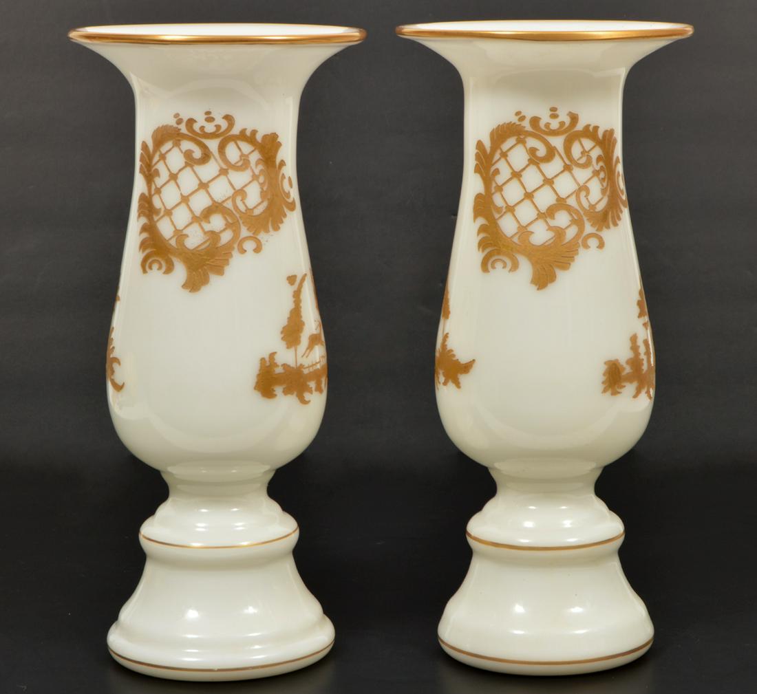 2 Victorian European Opaline Gilt Etched Vases: 2 Victorian European opaline glass with gilded etched designs. 10.5"H, 4.75" diameter. Condition report: Very good - no cracks or chips. Please examine all photos closely. Contact C. Biddle Auction Ga