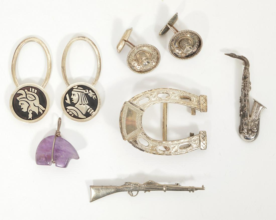 Lot Sterling Belt Buckle Key Chains Cufflinks: Lot of sterling silver: A) Taxco horseshoe belt buckle - 2"L, B) Pair of Mexican sombrero cufflinks - .75" diameter, C) 2 Mexican key holders - a rifle pin 2"L, a saxophone pin - 2.25"L, and an amethy