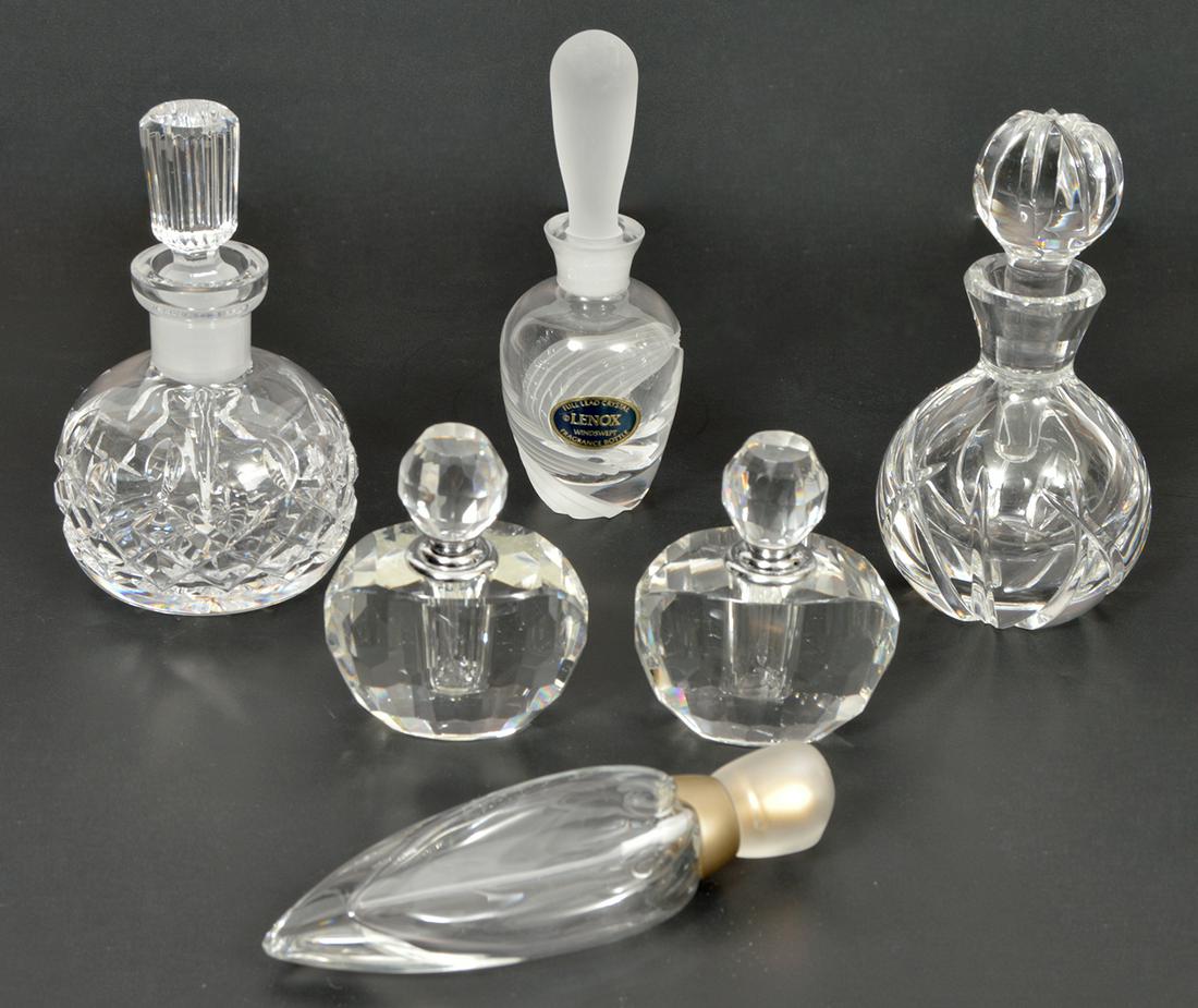 6 Crystal Perfume Bottles, 2 Waterford & 1 Lenox: Lot of 6 crystal perfume bottles with stoppers. 2 are Waterford and 1 is Lenox. Sizes range from 2"-5"H. Condition report: Very good - no issues; Please examine all photos closely. Contact C. Biddle A