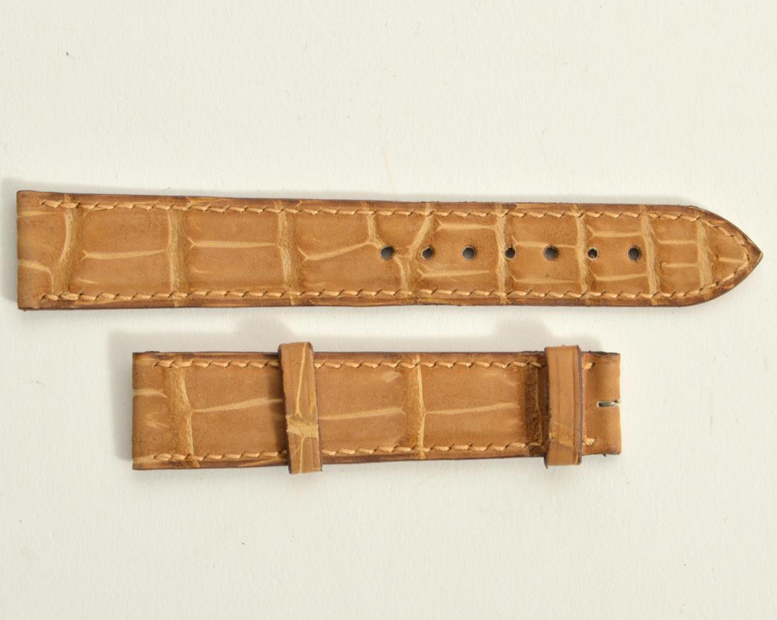 Boucheron Genuine Tan Crocodile Watch Band: Boucheron genuine tan crocodile watch band. Lug size: 18mm. Condition report: NEW. Please examine all photos closely. Contact C. Biddle Auction Gallery for more detailed information. C. Biddle Auction