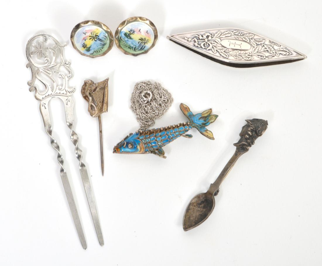 Vintage Sterling Silver Lot 38 Grams: Vintage sterling silver collection including: a pair of enameled screw back ocean scene earrings, .75" diameter; a harp stick pin 1.75"L; a highly embossed and engraved weaving needle, 2.5"L; an artic