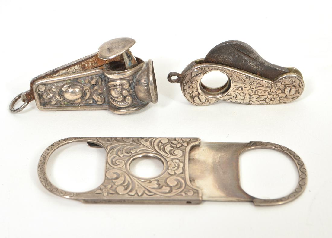 3 Sterling Silver Cheroot Cigar Cutters: 3 sterling silver cheroot cigar cutters. 1.25"-2.25"L. Condition report: good - no issues. Total weight: 25.9 grams. Please examine all photos closely. Contact C. Biddle Auction Gallery for more detai