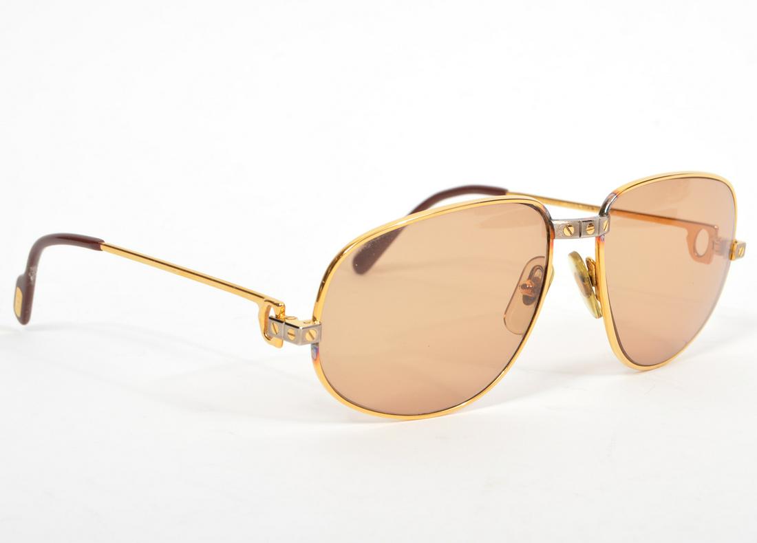 Cartier Gold Rim Sunglasses #58-16: Cartier gold rimmed sunglasses. Doesn't appear to be prescription lenses. Marked 58-16. Comes with Leather case. Condition report: Normal wear, see photos. Examine all photos closely. Please examine a