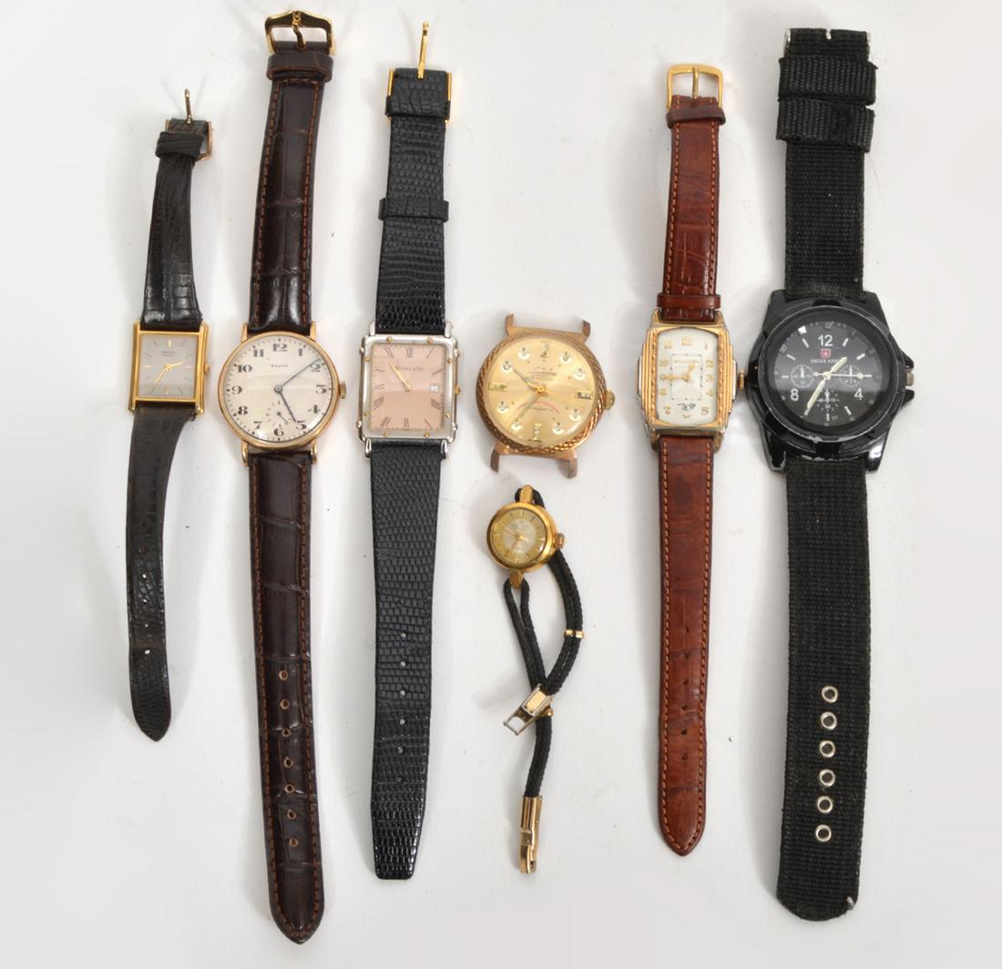Lot of 7 Vintage Watches, Tiffany Lucerne Seiko: A lot of 7 vintage watches for repair, parts or just batteries including a Tiffany & Co, Lucerne, Swiss Army, Baume, Bulova, Delma, Seiko. Condition report: Not running - may just need batteries or ca