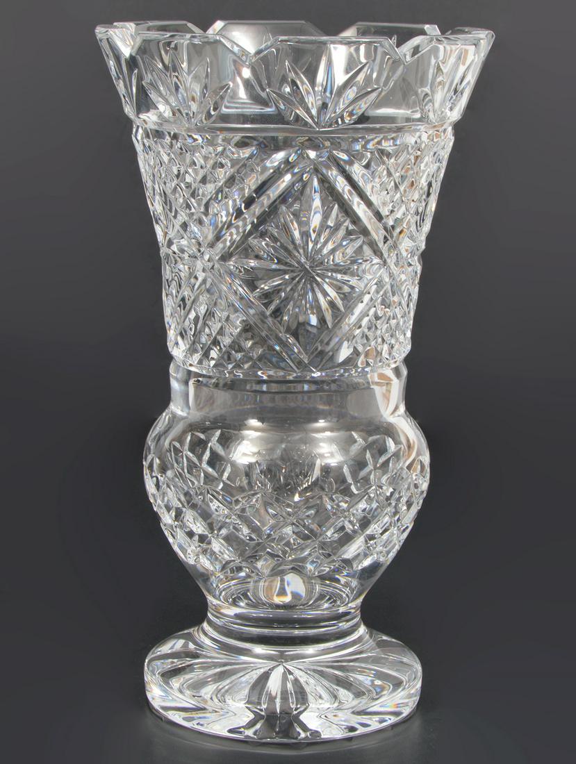 Waterford Crystal Vase: Waterford crystal vase. Marked on bottom Waterford and WS 1998. 8.5" H x 4.75" W. Condition report: very good condition. Please examine all photos closely. Contact C. Biddle Auction Gallery for more d