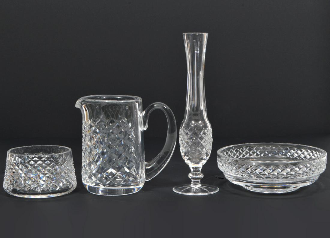 4 Pcs. Waterford Alana Crystal: Waterford Alana Crystal group includes bud vase (9.25"H); dish (2.5"H x 4.25"W); pitcher (5.5"H x 6"W); bowl (2.25"H x 6.5"W). Condition report: good condition, no issues, see photos. Please examine a