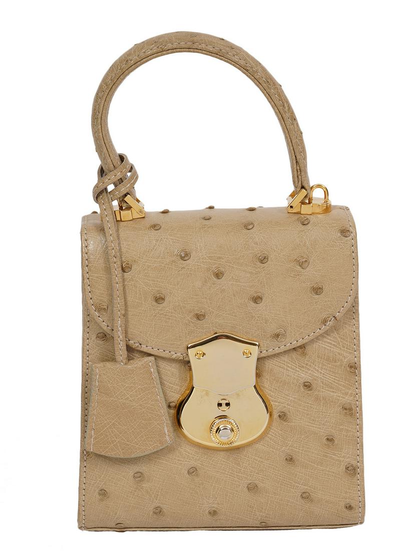 Eileen Kramer Mini Flat Ostrich Handbag: Eileen Kramer Ostrich mini-flap handbag with gold hardware. 5"L x 5.5"H x 2.5"W. Marked on inside. Condition report: good, see photos. Please examine all photos closely. Contact C. Biddle Auction Gall