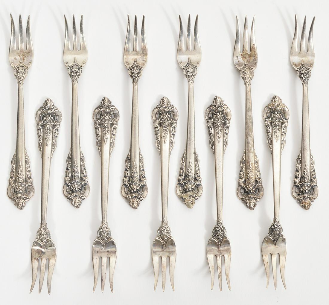 12 Sterling Grande Baroque Cocktail Forks: 12 sterling cocktail forks Grande Baroque pattern by Wallace, measure 5.5"L. Total weight 270 grams. Condition report: light surface wear and scratches from use, see photos. Please examine all photos 