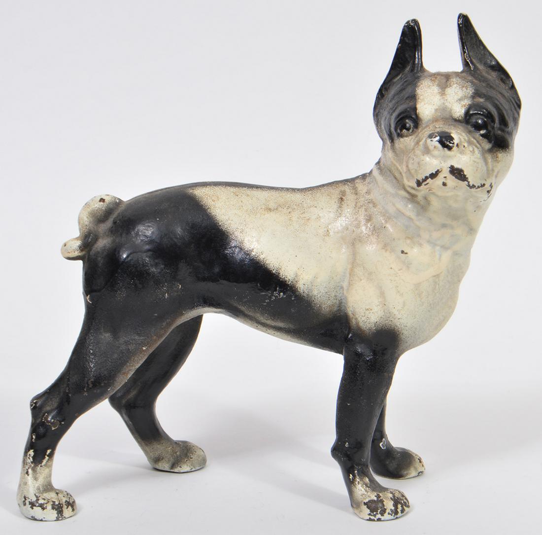 Boston Terrier Dog Doorstop By Hubley: Boston Terrier dog doorstop by Hubley. 10"L x 5" W x 10.25"H. Condition report: Good, some paint loss, see photos. Please examine all photos closely. Contact C. Biddle Auction Gallery for more detaile