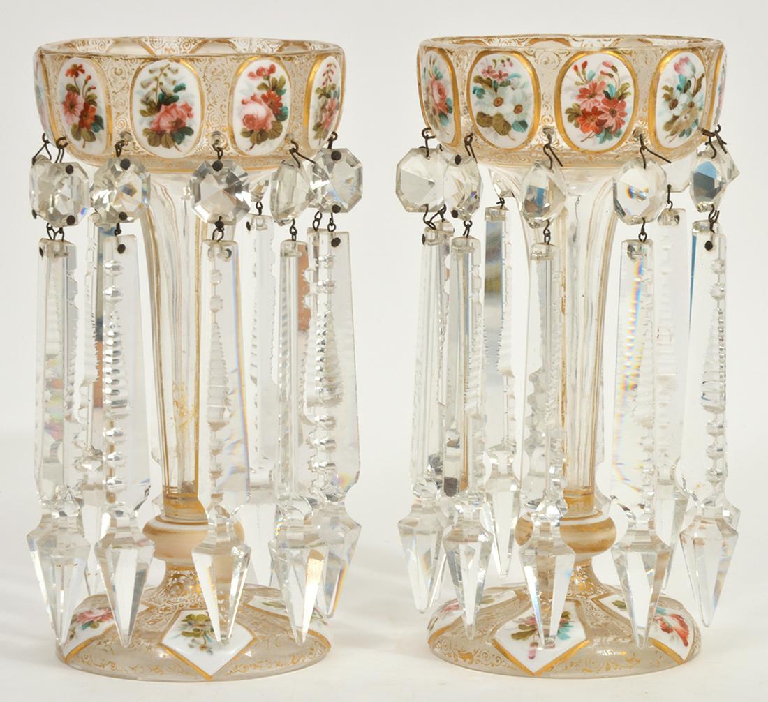 Pair of Bohemian White Cut to Clear Lustres: Pair of Bohemian white overlay cut to clear glass lustres. Each having medallions in white opaline, enameled with colorful flowers and leaves, gold tracing and highlights throughout. 8.25" H. Conditio
