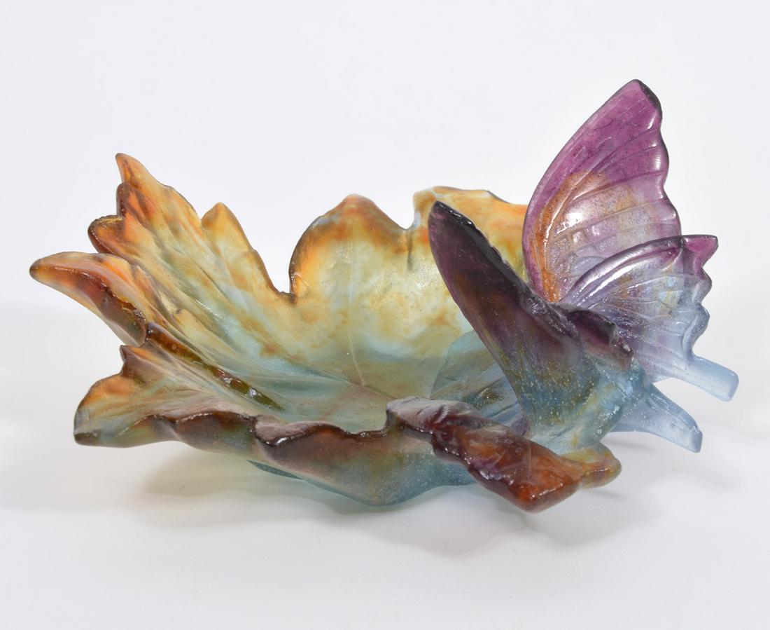 Daum Pate de Verre Grand Papillon Nature Dish: Daum France Pate de Verre dish shaped in the form of a leaf with a butterfly at one end, etched on bottom Daum France. Measures 7"L x 6.75"W x 3.25"H. Condition report: good condition, 2 flea bites, s