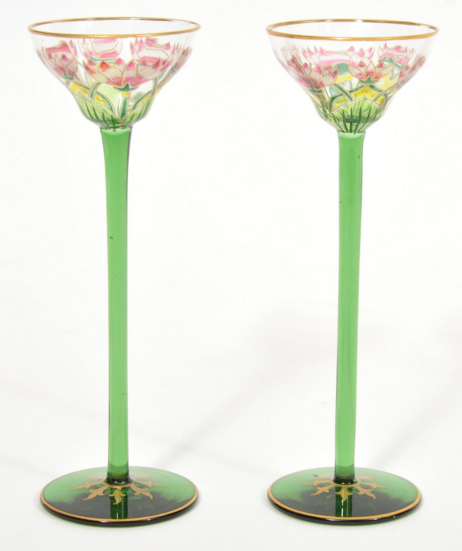 2 Austrian Meyr's Neffe Enameled Hock Wine Glasses: Pair of Austrian Meyr's Neffe enameled hock wine glasses in green & gilt stems with floral vessel. Markings on bottoms 631 & 6. 6" H x 2" W. Condition report: Good, no issues. Please examine all photo