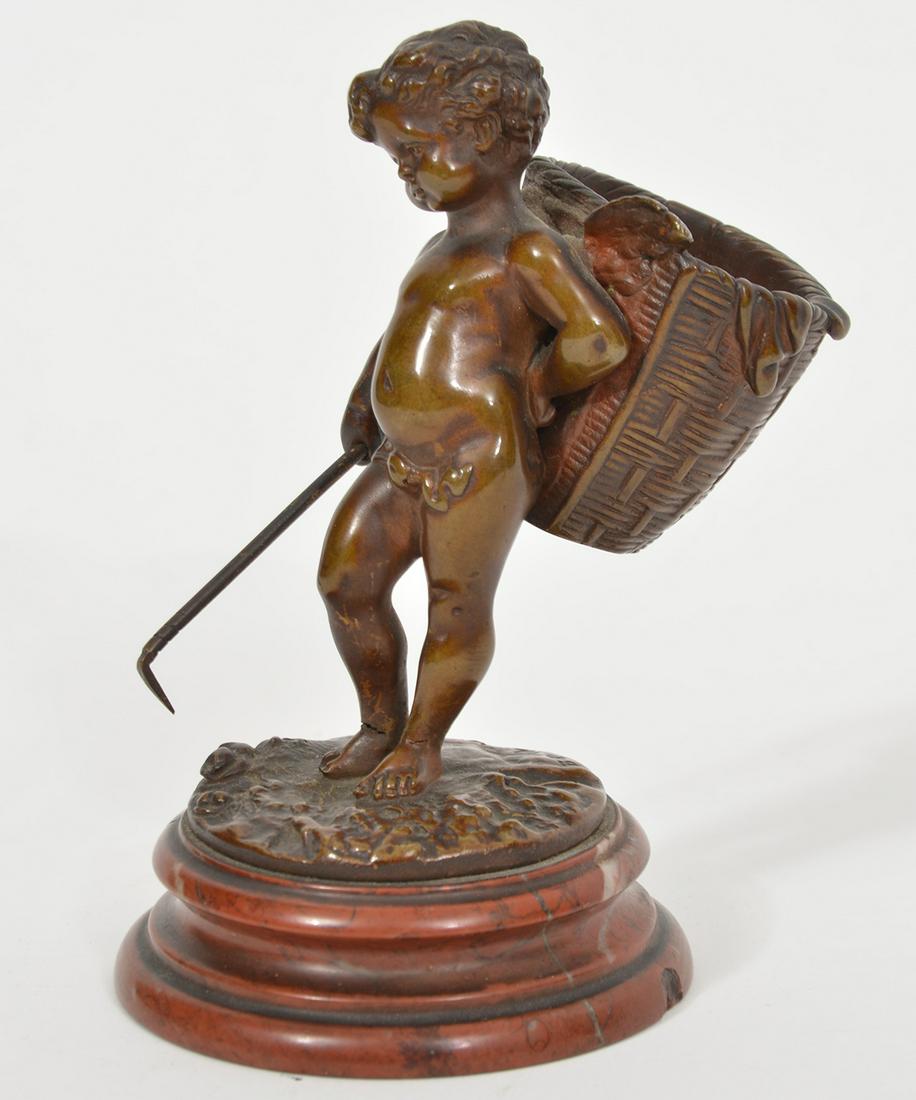 French Art Nouveau Putti w/ Clam Basket & Hook: 19th c. French Art Nouveau putti bronze, with a woven clam basket and hook, on rough marble base. Artist signed L. Kley. 5.25" H x 3" D. Condition report: Good. Please examine all photos closely. Cont