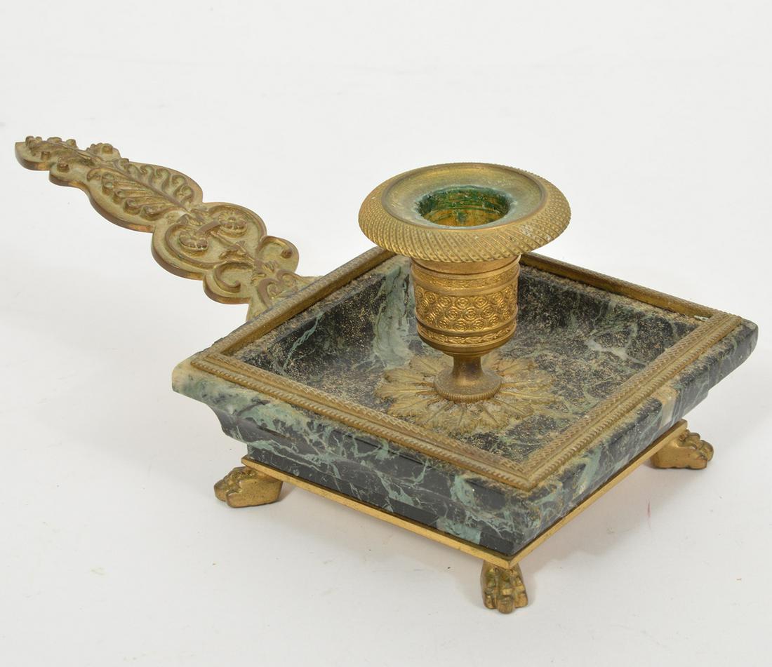 French Bronze & Marble Footed Chamber Stick: French Empire Bronze mounted single chamber stick candleholder on marble square base with paw feet. 8"L x 3.25"H. Condition report: Good, common wear and patina for age , please examine all photos clo