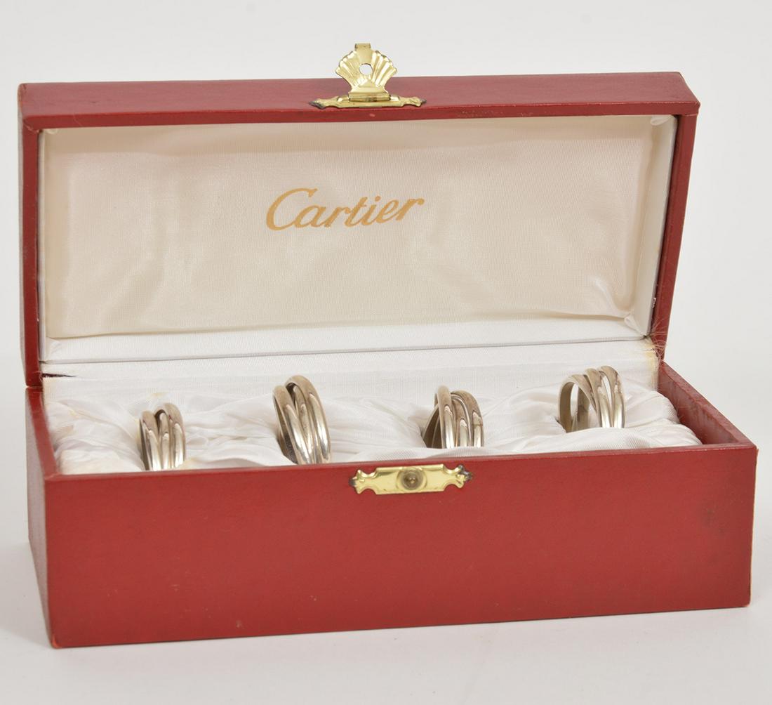 Four Cartier Trinity Sterling Silver Napkin Rings (1 of 7)