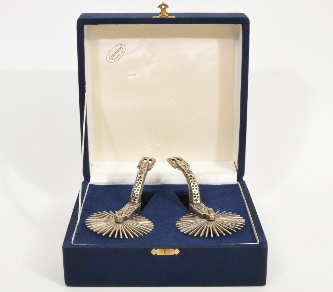 Hand-Made Chilean White Metal Gaucho Spurs: Hand-Made Chilean white metal (possibly nickel) Gaucho Spurs. 4" rowels. 7" long Marked "CHILE". Has ribbon with colors of Chilean flag. Comes in original box. Condition report: Good, no issues, pleas
