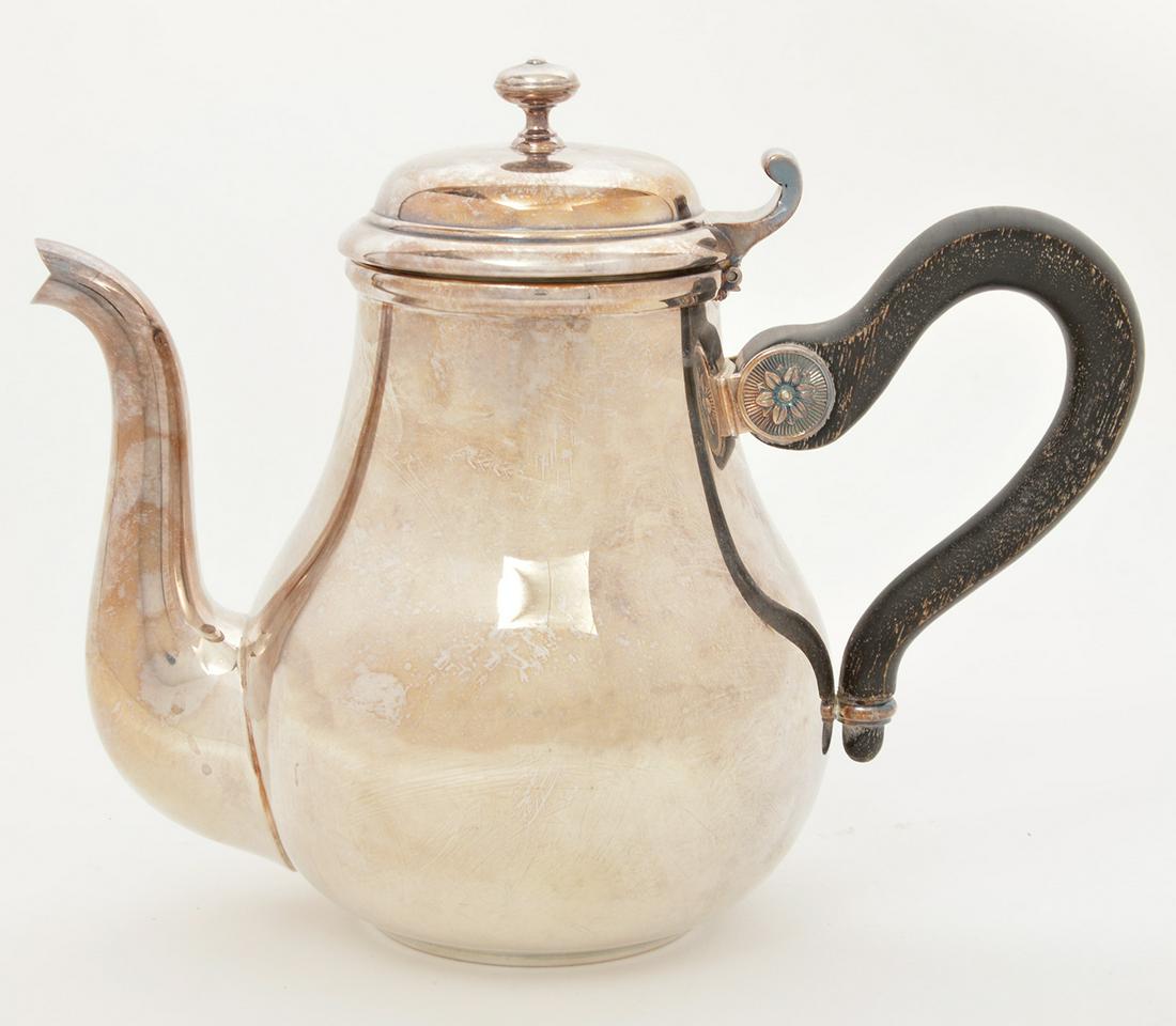 Christofle Silverplate Malmaison Teapot: Christofle Malmaison Teapot with ebony wood handle. 9.5" x 7.25". Genuine hallmarks on underside. Condition report: Good, common wear for age, please examine all photos closely. Contact C. Biddle Auct
