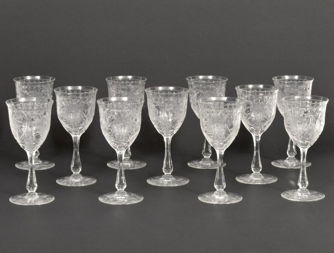 11 Brilliant Cut Pairpoint Rose' Wine Glasses: 11 brilliant cut Pairpoint rose wine glasses. Unmarked. 3" W x 6" H. Condition report: Good condition, no issues, please examine all photos closely. Contact C. Biddle Auction Gallery for more detailed