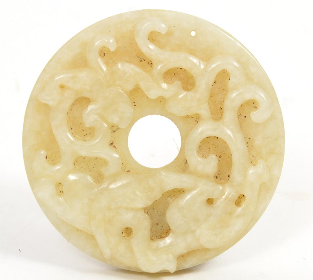 Chinese Hand Carved Jade Circular Ornament: Chinese hand carved jade circular ornament, carved on both sides, measures 2.5" diameter. Condition report: Good condition, no issues, please examine all photos closely. Contact C. Biddle Auction Gall