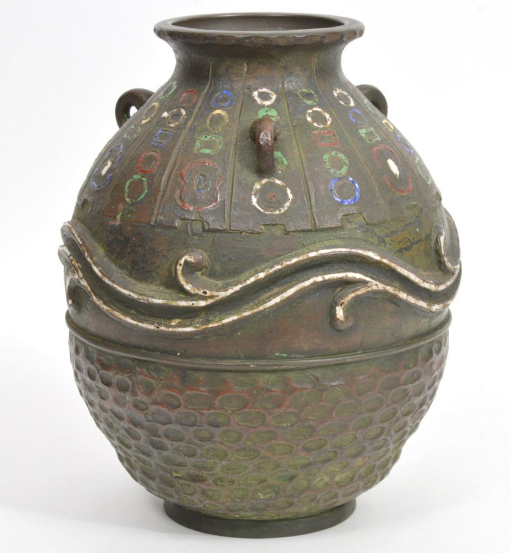 Chinese Hammered Metal Vase: Chinese metal vase with geometric patterns, hammered lower half and signed on underside. Measures 8"W x 10.75"L. Condition report: Good condition, common wear for age and use, please examine all photo