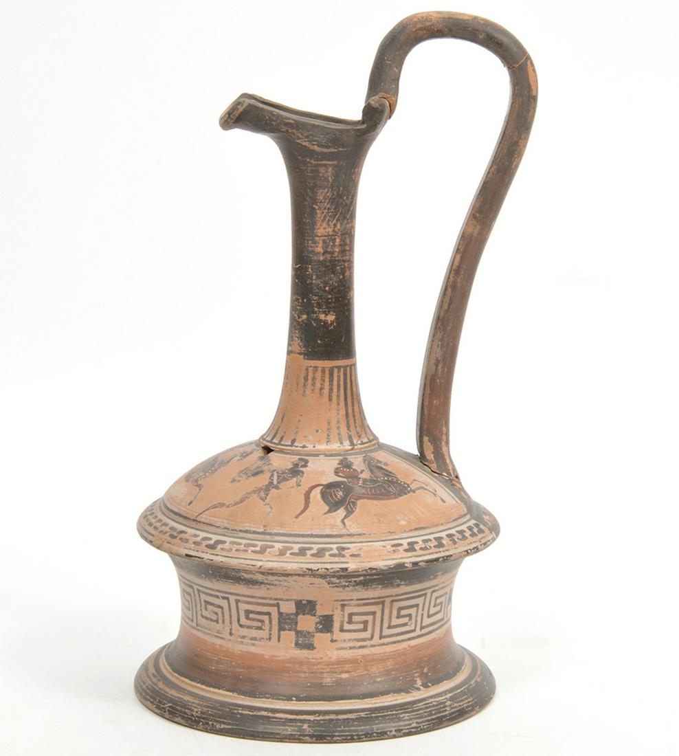 Antique Greek Pottery Pitcher: Restored Greek antique pottery pitcher decorated with Greek soldiers on horseback and Greek key designs. Measures 6"W x 11.25"H. Condition report: repaired/restored in several places, some cracks, bre