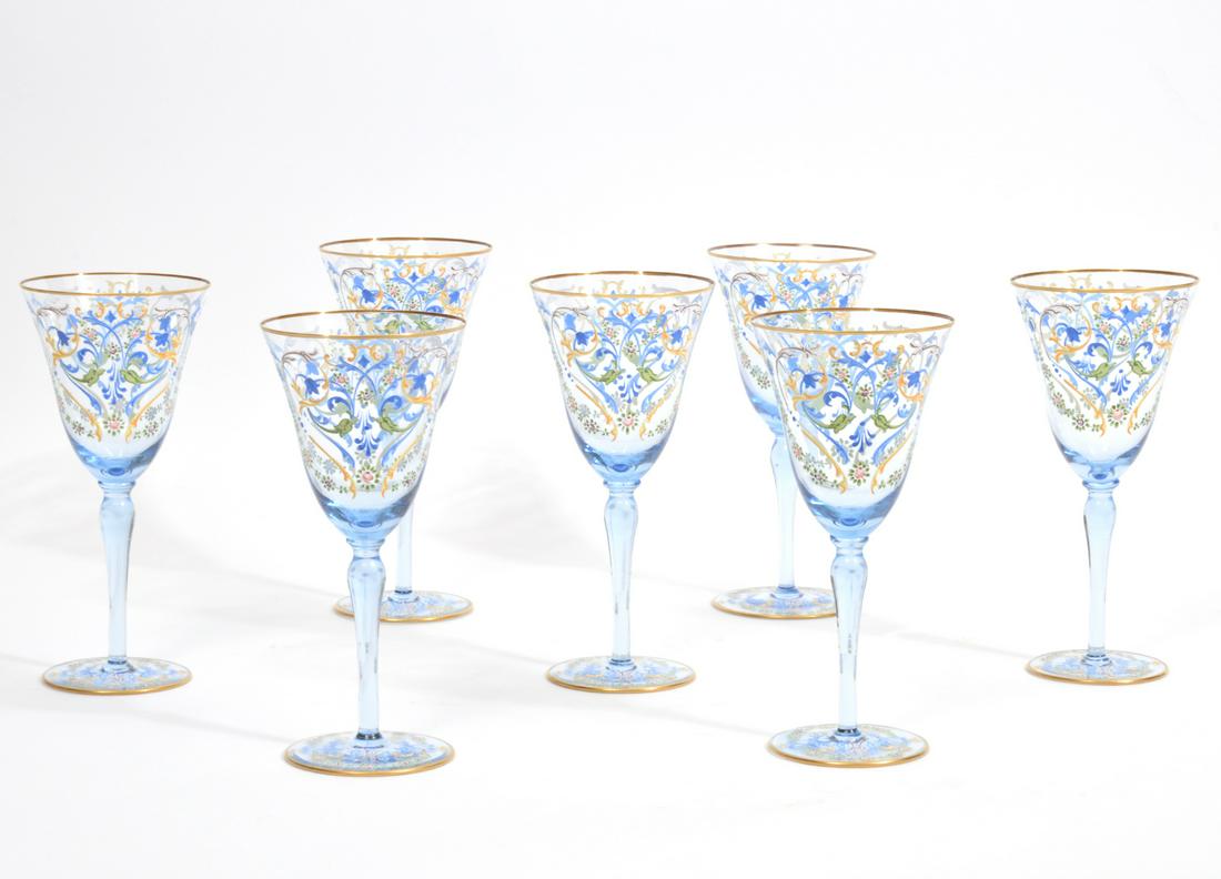 Set of 7 Salviati Venetian Wine Glasses: Set of 7 Salviati Venetian wine glasses with Moser-style foliate decoration and gilt rim. Signed on underside. Measures 3.5"W x 7.25"H. Condition report: Good condition, please examine all photos clos