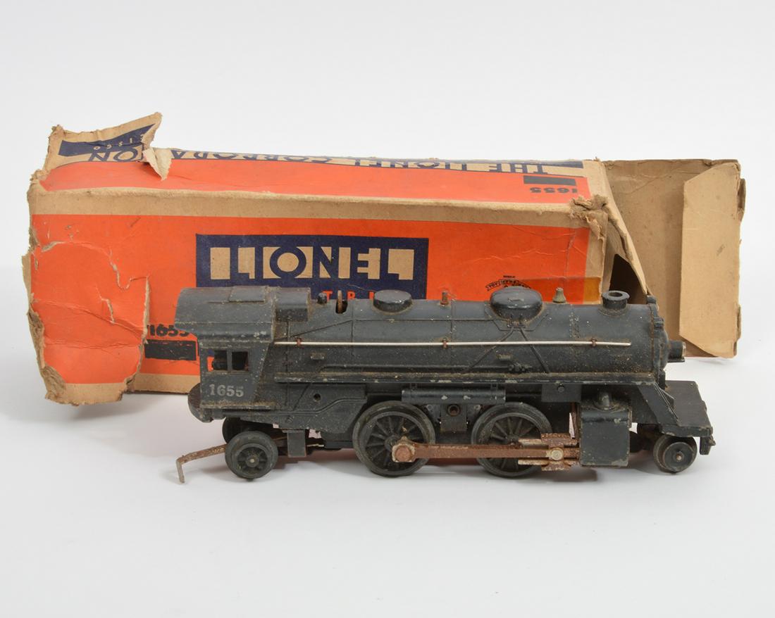 Lionel Trains Locomotive No. 1655: Lionel Trains locomotive No. 1655, for '027' track. Measures 9"L x 2.25"W x 3.25"H. Comes with original box, in poor condition. Condition report: Much rust and some paint loss, please examine all phot