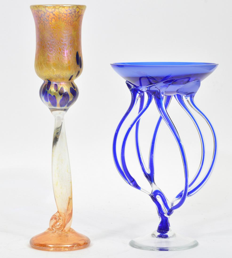 Two Contemporary Hand-Blown Art Glass Objects: Brioni hand-blown art glass goblet with yellow and blue hues and a twisted stem. Measures 3" W x 12.25"H; hand-blown blue pedestal bowl. Measures 4.75"W x 9.25"H. Condition report: Good condition, two