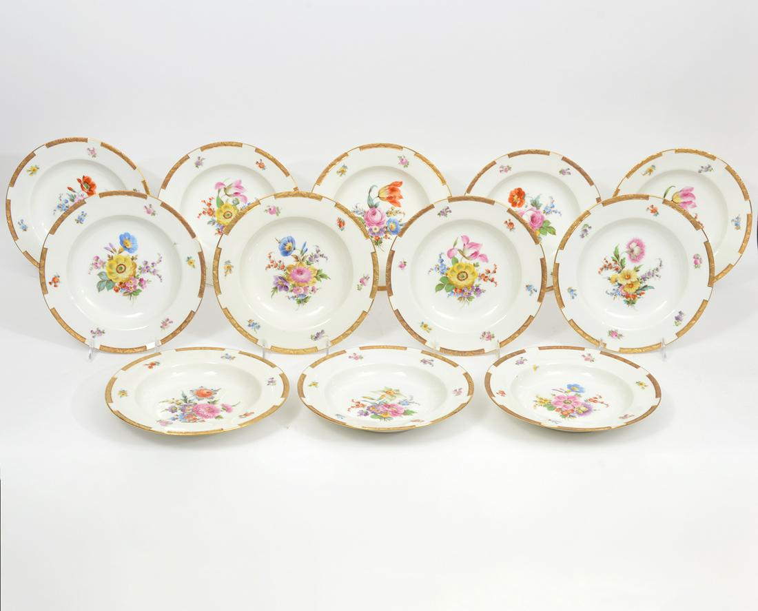 12 KPM Hutschenreuther Dresden Soup Bowls: 12 KPM Hutschenreuther Hohenberg Dresden soup bowls in floral pattern with heavy gilt decorations in relief. Marked on bottom with KPM Sceptre and Abteilung Dresden Handmalerei. Measures 9.5"W x 1.5"H