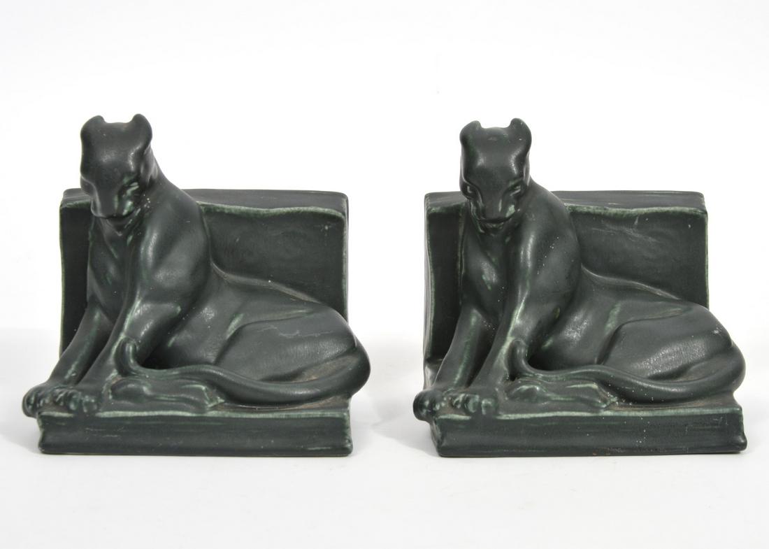 Rookwood Pottery Panther Bookends: Rookwood pottery Panther bookends, circa 1920, numbered 2564. Measures 5.75"L x 4.25"W x 5.5"H. Impressed hallmark underside. Condition report: good condition, no issues, please examine all photos clo