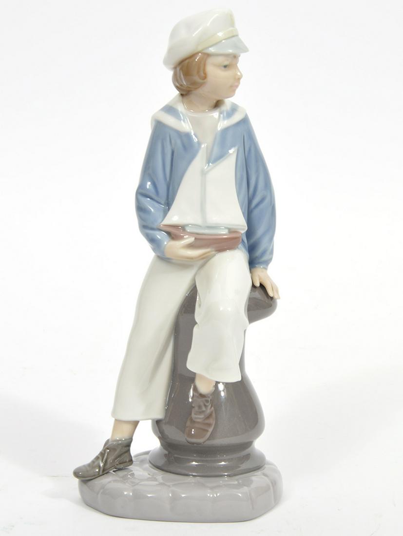 Lladro 'Boy with Yacht' Porcelain Figure (1 of 5)