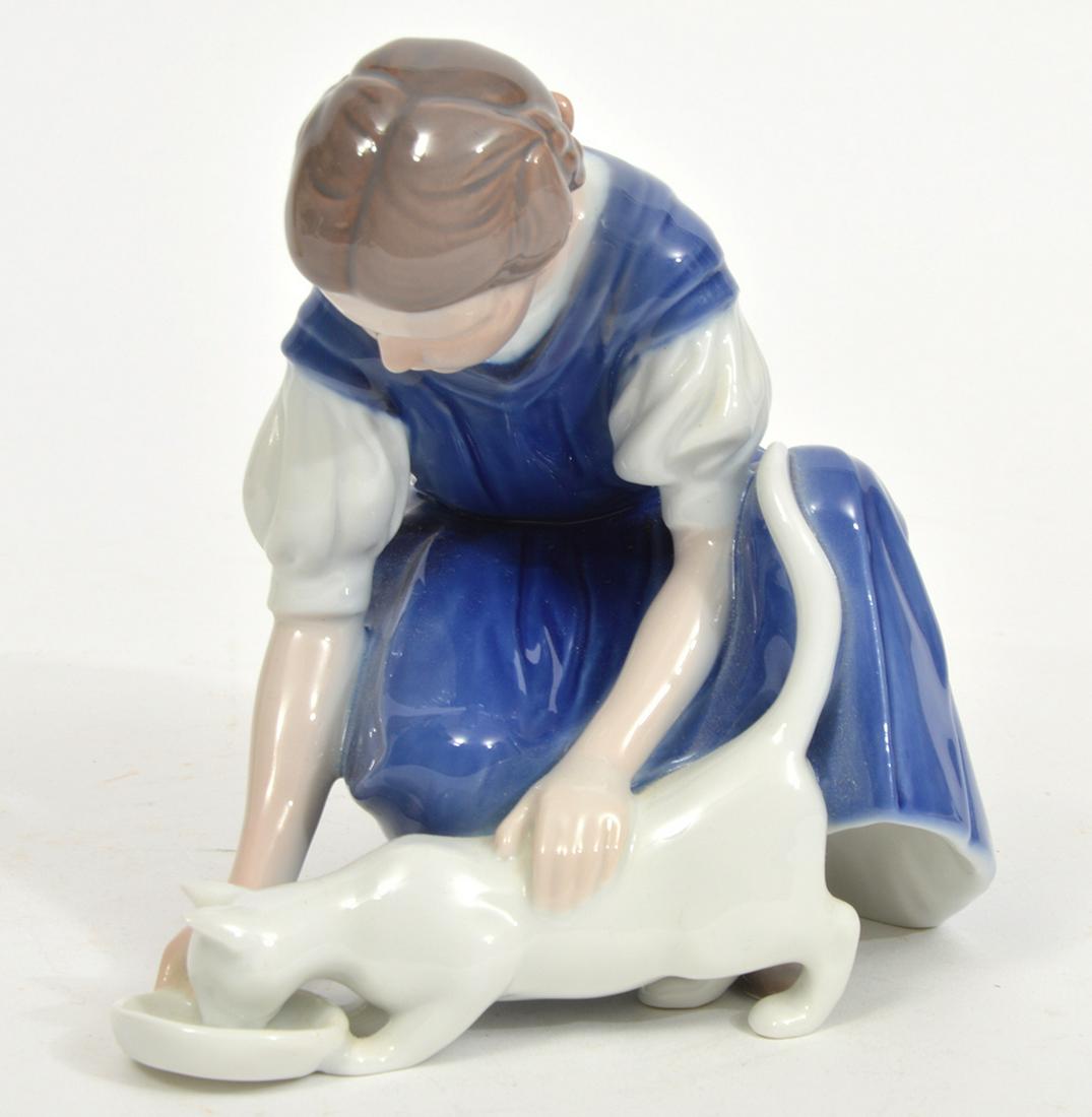 B & G Copenhagen 'Only One Drop' Girl & Cat Figure: Bing & Grondahl Copenhagen 'Only One Drop' girl and cat glazed porcelain figure. Hallmarked underside. Measures 6"L x 4"W x 5.5"H. Condition report: Good condition, no issues, please examine all photo