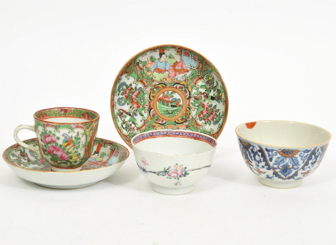 Chinese Hand-Painted Tea Cups and Saucers: Chinese rose medallion tea cup (3"W x 2"H) and two saucers (4.5"); Two additional tea cups (3" & 3.5"W x 1.75"H) with floral patterns. Condition report: Chips to edge of tea cups, please examine all p