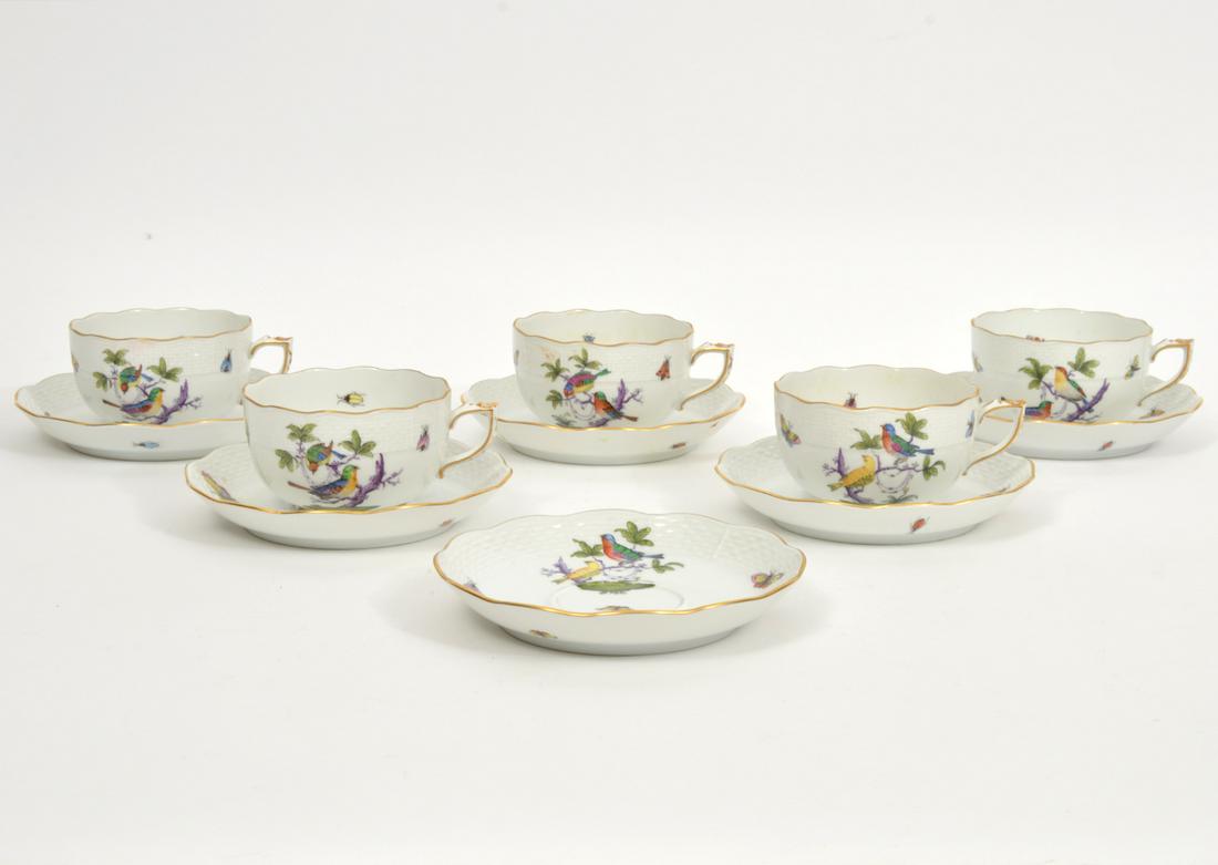 Herend 'Rothschild Bird' Coffee Cups Saucers 11Pc: Herend 'Rothschild Bird' 5 coffee cups and 6 saucers, decorated with colorful birds and insects, basketweave pattern with gilt rims. Cups measures 4.5"W x 3.25"H, saucer 5.5" diameter. Condition repor