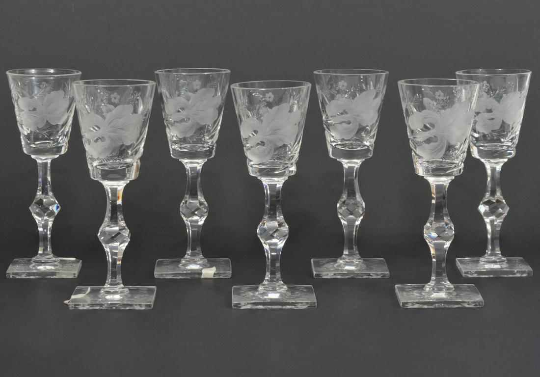 Set of 7 Hawkes 'Satin Iris' Wine Glasses: Hawkes, American brilliant cut glass, 'Satin Iris' pattern wine glasses. Cut glass and frosted floral decoration, square base, acid etched marked at base. Measures 6.75"H x 2.5"W. Condition report: fl