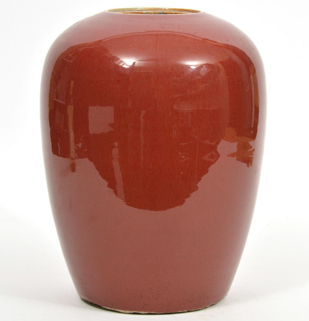 Chinese Oxblood Sang de Boeuf Jar: Chinese oxblood sang de boeuf jar. Measures 8.5"W x 13"H. Condition report: Underside edge has chips and common light surface wear throughout. Please examine all photos closely. Contact C. Biddle Auct