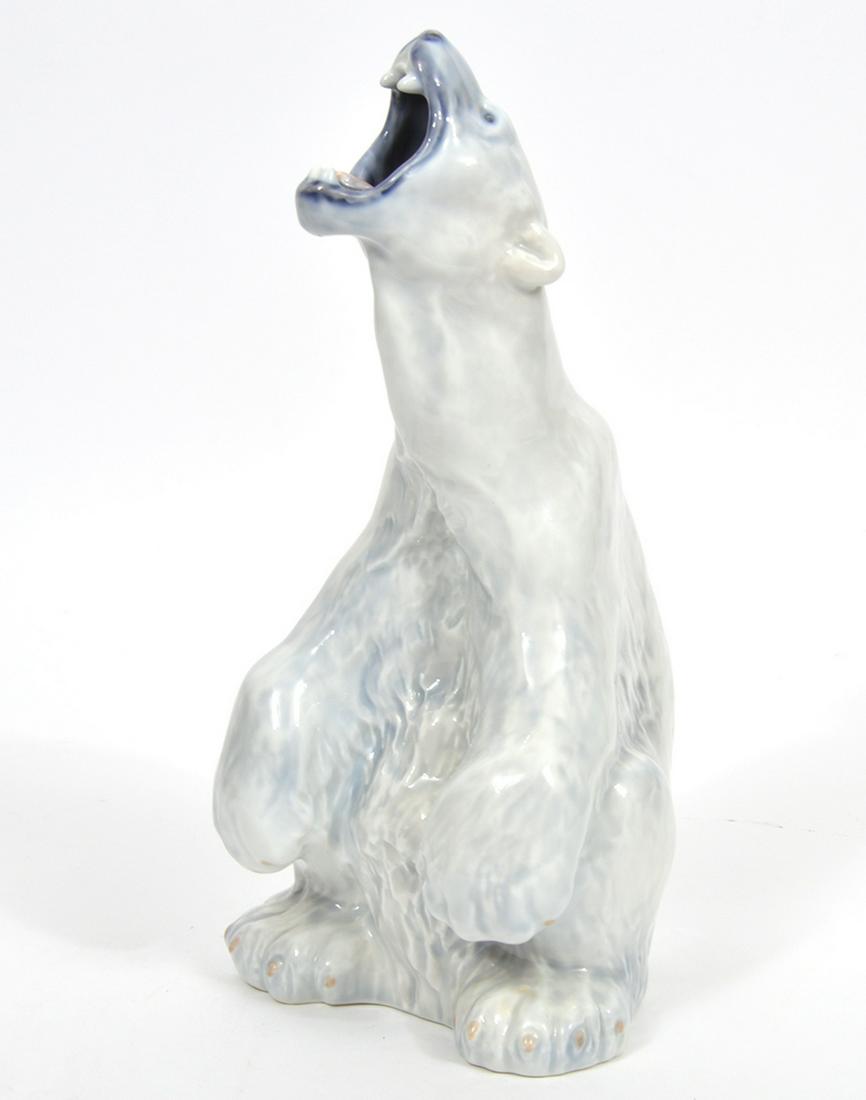 Royal Copenhagen Porcelain Polar Bear Figure: Royal Copenhagen Denmark, glazed porcelain standing polar bear, measures 6"L x 5.5"W x 13"H. Underglaze mark underside. Condition report: Good condition, no issues, please examine all photos closely. 