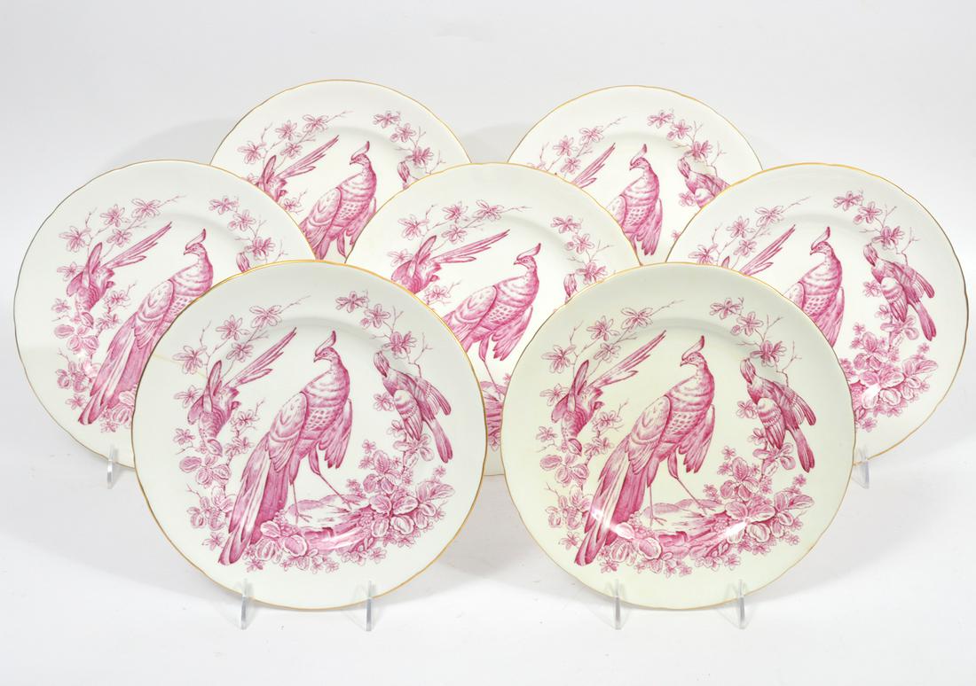 7 Royal Crown Derby 'Chelsea Bird Pink' Plates: Set of 7 dinner plates by Royal Crown Derby in the 'Pink Chelsea Bird' pattern. Marked on underside. 10.25" W. Condition report: One has crack on edge and some knife marks from use. Please see photos.