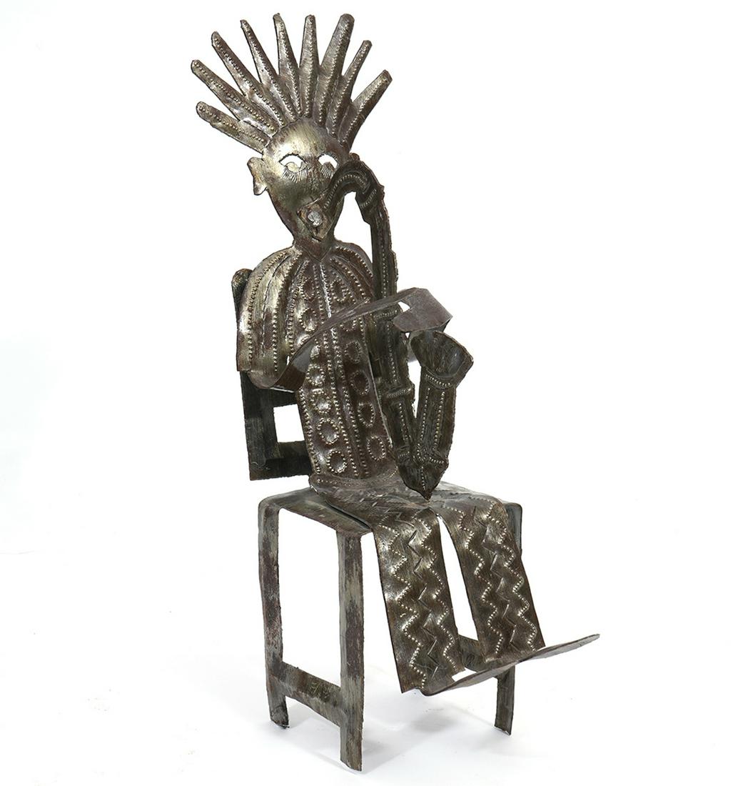 Jonas S Haiti Saxophone Player Metal Sculpture: Jonas Soulouque ( Haiti, 20th Century) hand-made saxophone player metal sculpture, signing underside by artist. Measures 6"L x 3"W x 11"H. Condition report: Good condition, no issues, Please examine a