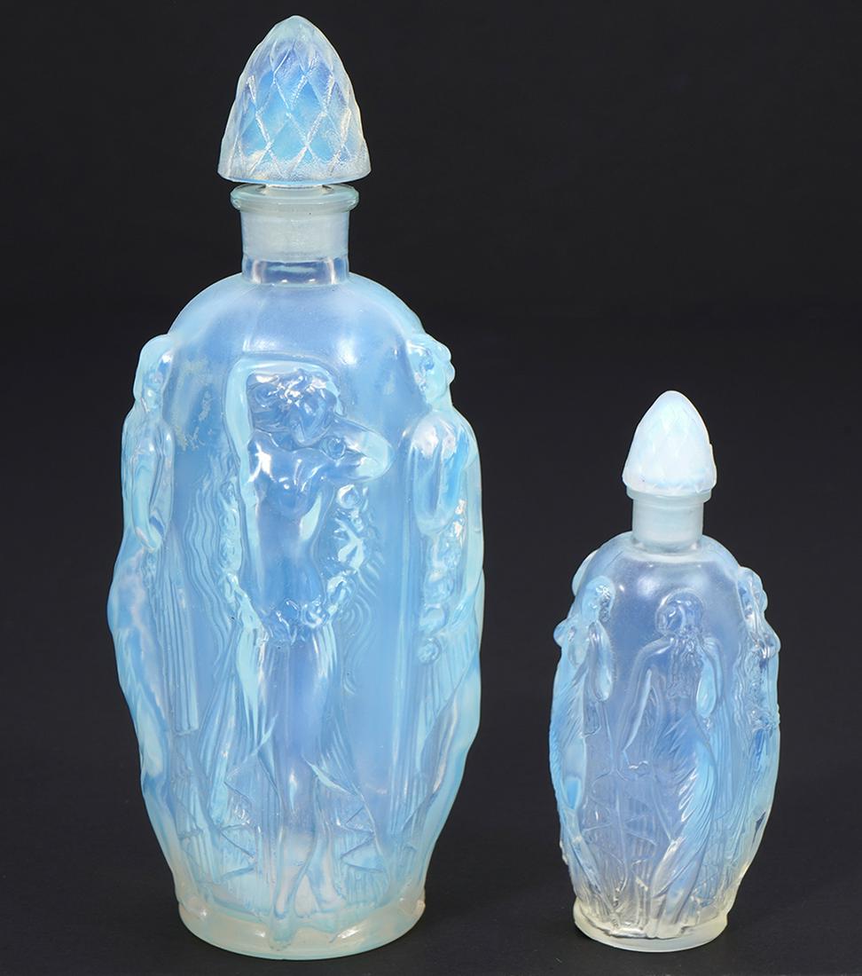 Sabino French Opalescent Glass Perfume Bottles: Sabino French opalescent embossed glass "Gaite" perfume bottles, features Deco-style female nude figures, and cone shaped stoppers. Underside stickers. Large measures 6.25 x 2.5 ; Small 3.75"H x 1.5"W