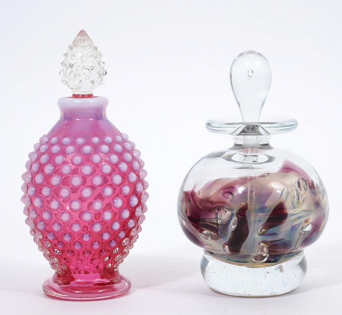 David R. Boutin & Pink White Dots Perfume Bottles: David R. Boutin art glass perfume bottle, signed at base edge, measures 4.75"H x 3"W; Pink with applied white dots and spiky cone stopper, measures 5.25'L x 2.5"W. Condition report: Good condition, no