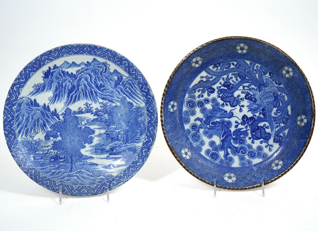 2 Chinese Blue & White Porcelain Platters: 2 Chinese blue & white porcelain round platters, measure 12"W. Scalloped gilt rim on one has dragon motif with floral border, impressed Chinese mark on underside. Second one has outdoor landscape scen