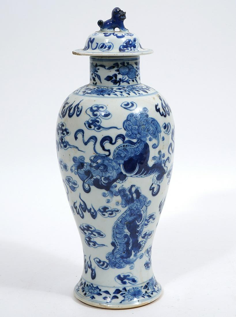 Chinese Blue & White Porcelain Dragon Vase: Chinese porcelain blue and white vase with dragon design. Marked on bottom. 10.75" H x 5.5" W. Condition report: normal wear and some minor nicks. Please examine all photos closely. Contact C. Biddle 