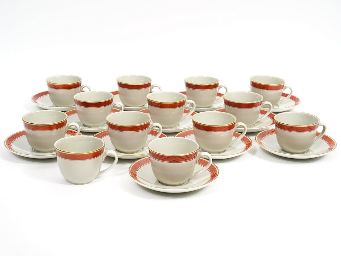 25Pc Royal Copenhagen Aluminia Tea Cups & Saucers: Royal Copenhagen Denmark Aluminia Oranje pattern, 13 tea cups (3.75"W x 2.5"H) & 12 matching saucers(5.5"). Condition report: Very minor surface cracks to glaze throughout, Please examine all photos c