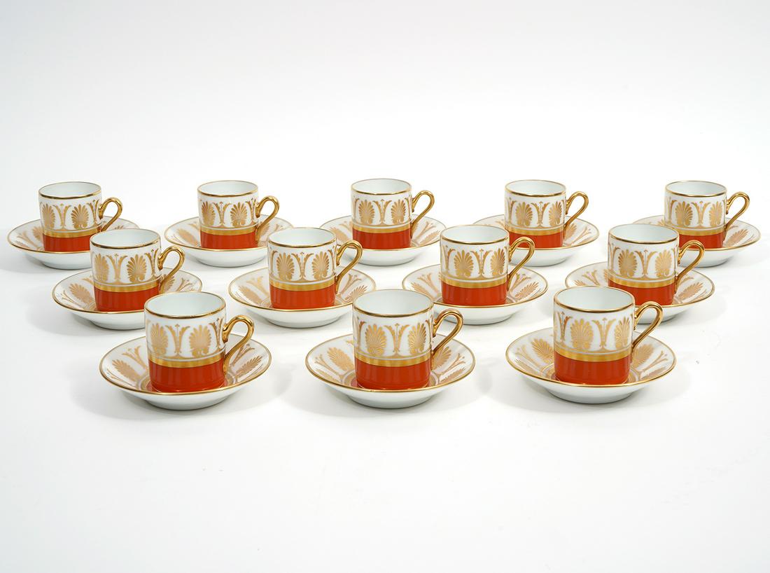 Richard Ginori Pompeii Orange Demitasse Set for 12: Richard Ginori 'Pompeii Orange' 12 demitasse tea cups (2.75"W x 2.25"H) and matching saucers (4.25"), underside hallmarked. Features repeating acanthus leaves with orange and gold rims. Condition repo