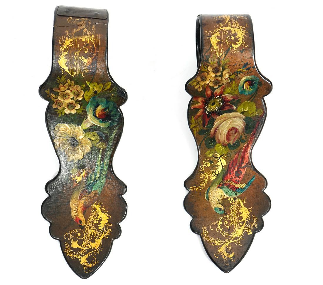 English Papa Mache Wall Mounted Curtain Holders: English Papa Mache lacquer wall mounted curtain holders, featuring flowers and birds with gilt accents, measures 9.25"L x 3.25"W. Old metal repair on one mount. Condition report: Common cracking and w