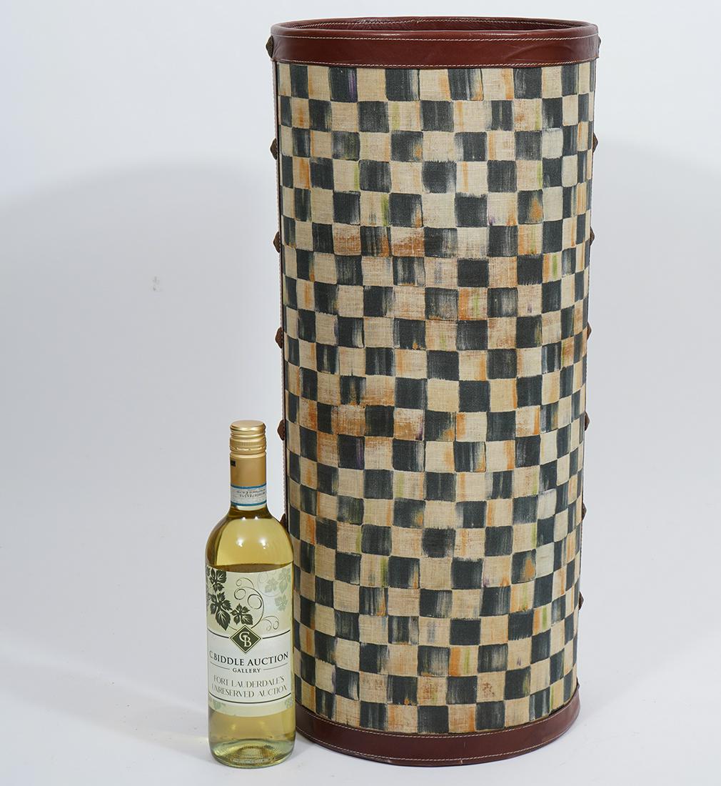 MacKenzie-Childs Courtly Check Umbrella Stand: MacKenzie-Childs courtly check pattern linen and leather umbrella stand, measures 24.5"H x 11"W. Condition report: Minor rips to linen, minor scratches and scuffs from use. Please examine all photos c