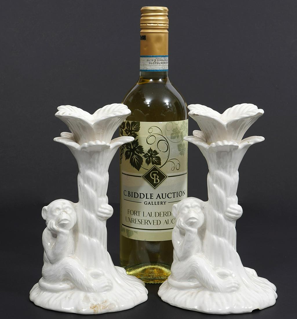 Monkey and Tree Porcelain Candlesticks: Monkey and Tree porcelain candlesticks, 4.5"W x 7.75"H. Marked "FF" underside. Condition report: Good condition, Minor wax residue, please examine all photos closely. Contact C. Biddle Auction Gallery